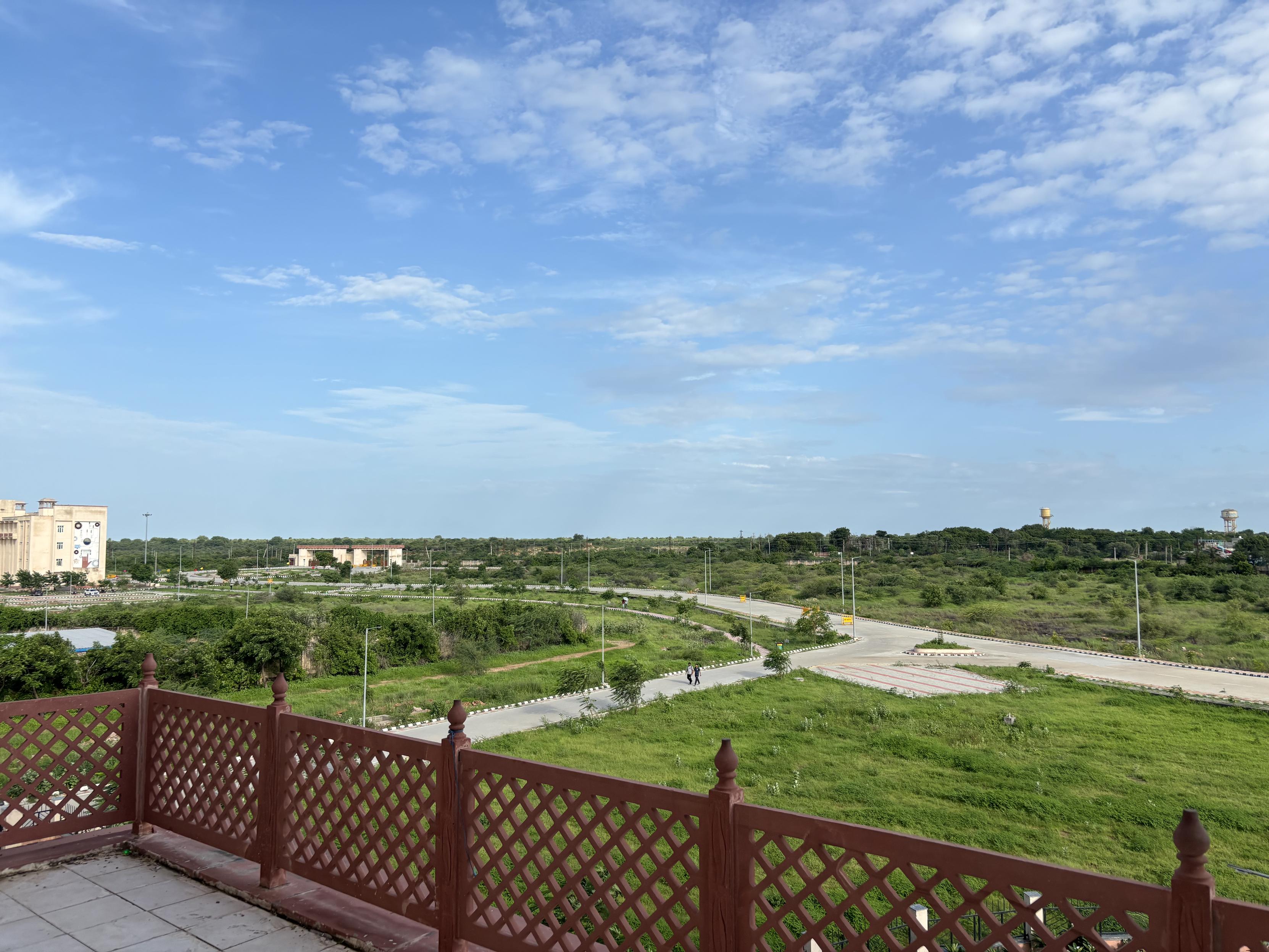 View of IIIT Kota campus including academic building, main gate, and Ranpur village